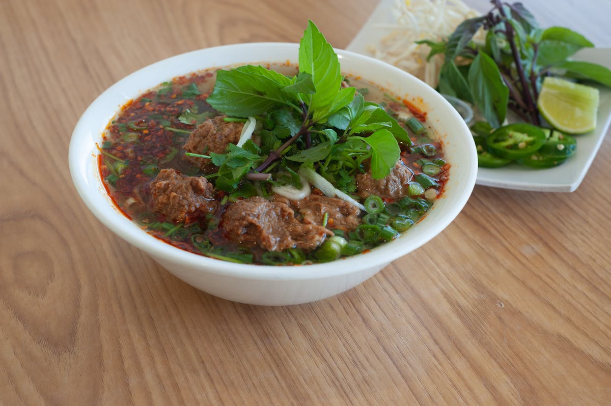 a bowl of food sitting on a table